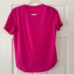 Pink Lululemon short sleeve sweat wicking shirt